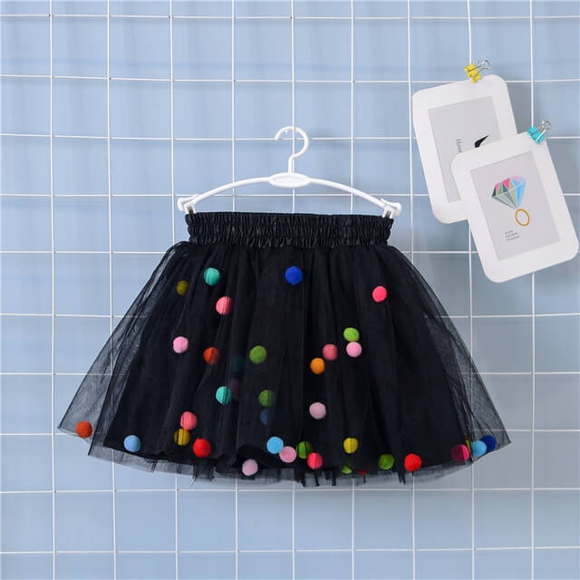 Saia de store tule com pompom